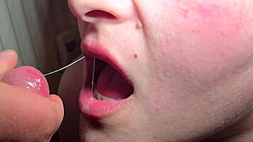 Close-up tongue catches every drop in explosive milf blowjob cumshot