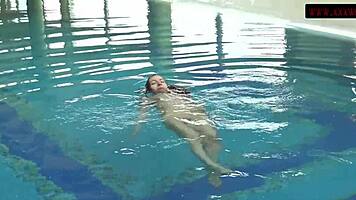 brunette babe mia ferrari dives into tight pool swimsuit tease