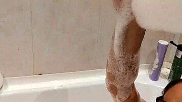 Tanned Big Tits Beauty Teases Pussy in Bathroom