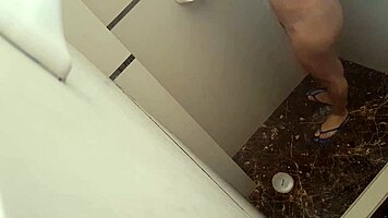 gorgeous colombian petite showers in bathroom and notices voyeur
