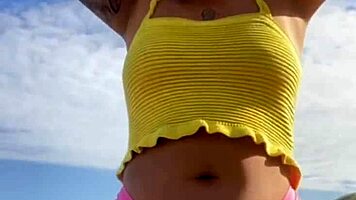 swollen puffy pussy lips flash from tiny bikini at beach