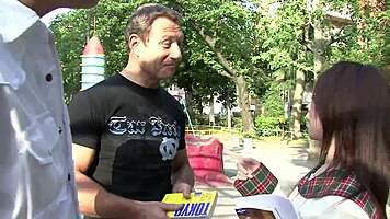 Japanese coed slurps two monster cocks hungrily