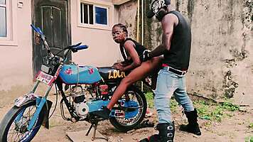 Petite biker babe stands on bike taking hard public garage fuck from man!