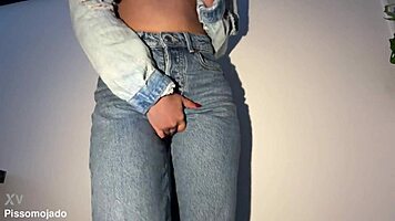 desperate girl soaks jeans in urgent pee stream