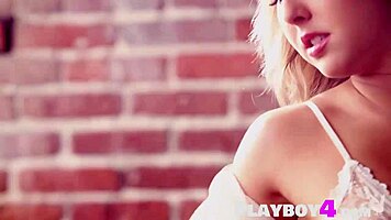 petite blonde model flaunts perfect big tits teasingly