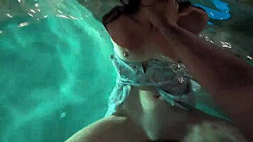 teasing babe seduces with outdoor pool play