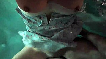 teasing babe seduces with outdoor pool play