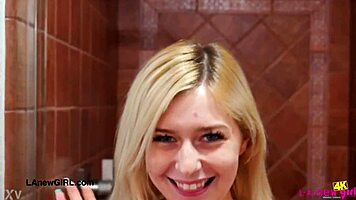 sun kissed blonde model strips in steamy shower session