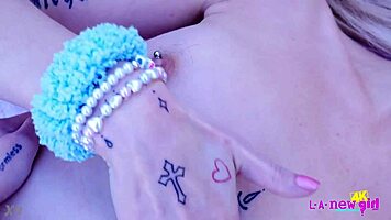 Petite blonde milf strips naked for close-up sofa massage tease