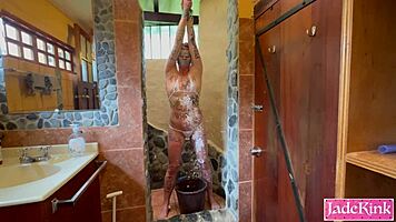 submissive slut bound in bathroom takes rough foam punishment