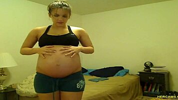pregnant tori taylor teases in tight blue shorts