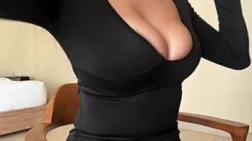 check out these big milky tits busting black dress everywhere