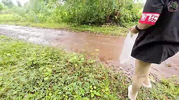 Thai babe hikes skirt flashing shaved pussy outdoors in garden