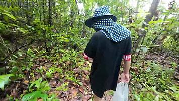 Thai babe hikes skirt flashing shaved pussy outdoors in garden