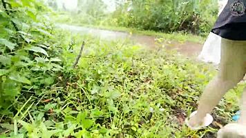 Thai babe hikes skirt flashing shaved pussy outdoors in garden