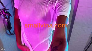 Watch this busty brunette strip curves in bathroom solo