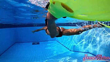 I'm swimming plugged and fingering outdoors by the pool