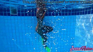 I'm swimming plugged and fingering outdoors by the pool