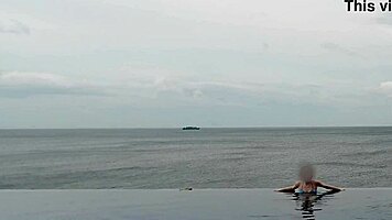 wanna see this cute japanese college girl by the infinity pool?