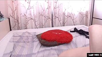 Horny chinese teen masturbates wet pussy on cam