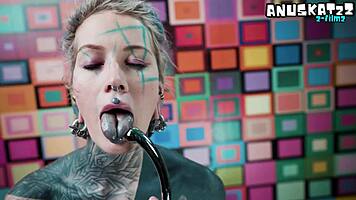 Watch me suck this steel toy like your cock in my pink corset