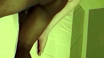 woman eagerly swallows massive black cock while fingering herself to orgasm