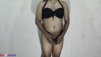 Indian shemale crossdresses in lime bikini solo tease