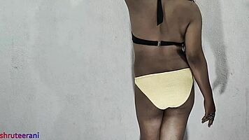Indian shemale crossdresses in lime bikini solo tease