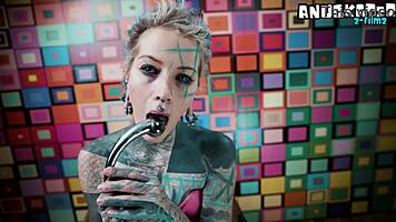 Pink corset tempts with steel toy anal and wand squirt tease