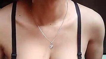 asian ladyboy strokes her hard cock solo in office