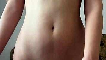 check out this cute petite teen fingering her wet shaved pussy to orgasm