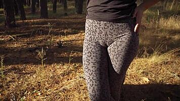 Girl teases fat tight cameltoe pussy lips in outdoor leggings