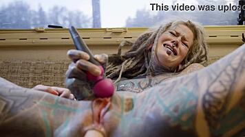 tattooed goth lesbian fists petite friend's ass in van