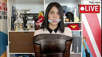 Gaby Meza bound tight as Wonder Woman gagged in BDSM torment watch her struggle helplessly now