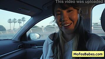 sexy asian tomie tang teases natural big boobs in car