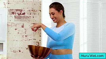 bella rolland pours slippery nuru gel n rubs her big naked tits on evan stone