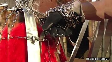 Skinny brunette whore Scott Rhodes gags on deepthroat toys and squirts in cage humiliation