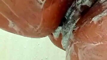 Young Brunette Spreads Hairy Pussy Close-Up Before Shaving It Smooth