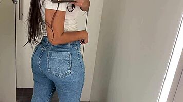 Skinny Brazilian teen fingers juicy swollen pussy lips flashing in shopping mall changing room