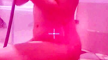 her sensual curves tease beneath shimmering wet skin