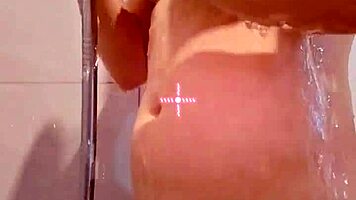 her sensual curves tease beneath shimmering wet skin