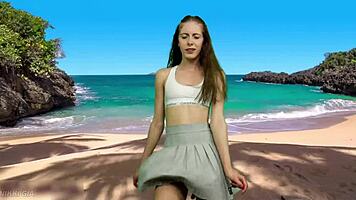 playful beach dancer teases with no panties flashing her curvy tight pussy lips