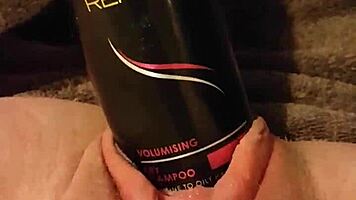 stretch my gaping pussy with this huge hairspray can slut!