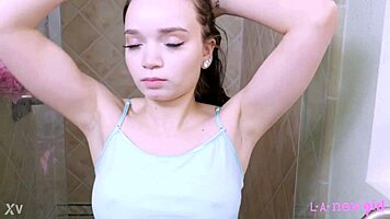 Fierce brunette stunner slips into steamy shower seduction