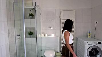 petite brunette bored ignored bathroom miniskirt socks