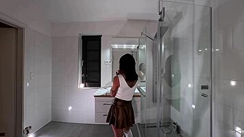 petite brunette bored ignored bathroom miniskirt socks