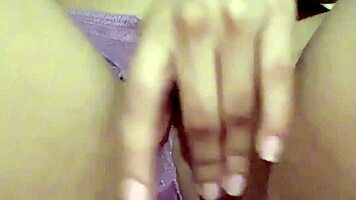 petite teen fingers her horny pussy solo