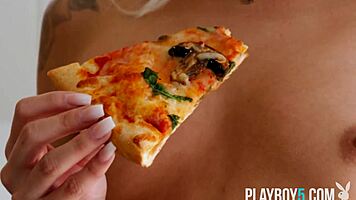 blonde teen bombshell strips big bubble ass while munching pizza casually