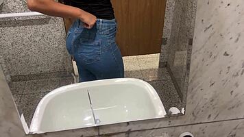 Girl fingers herself in mall bathroom till juicy squirt