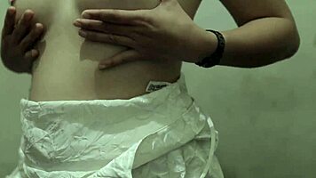 smooth indonesian babe strips skirt and fingers her wet pussy desperately